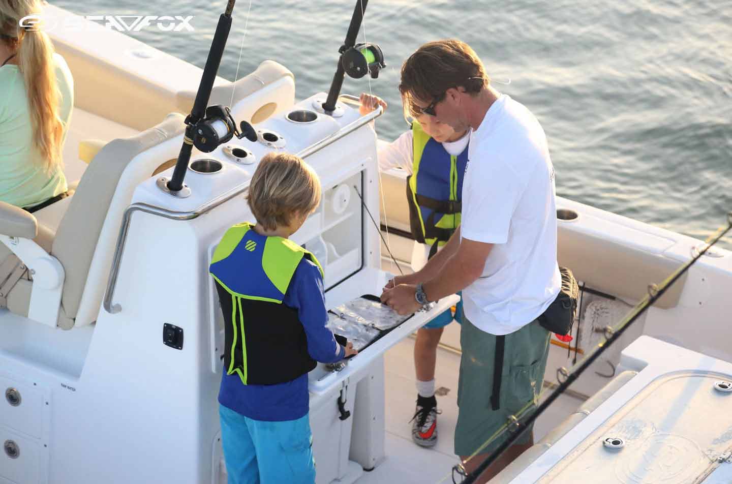 Father and son fishing on a Sea Fox Commander.