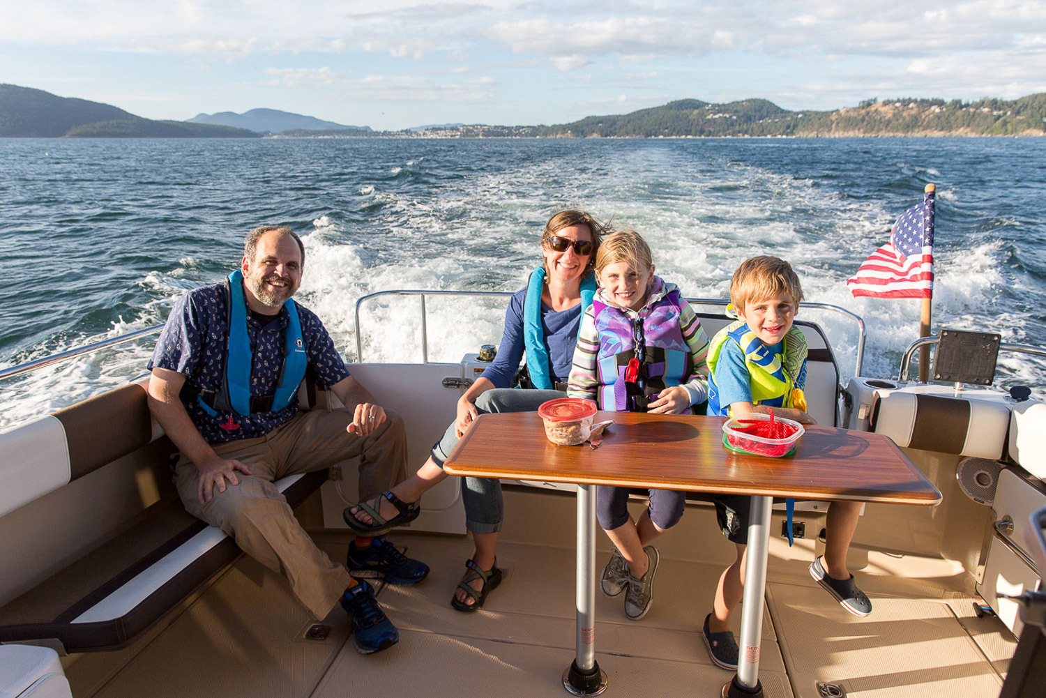 Family enjoying the Command Bridge on a Ranger Tug R-29.